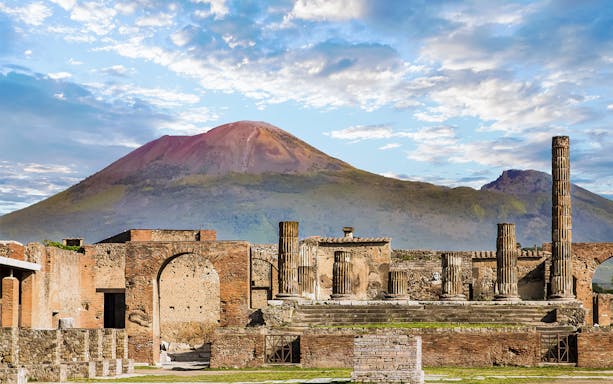 Pompeii ruins with Mount Vesuvius in the background.