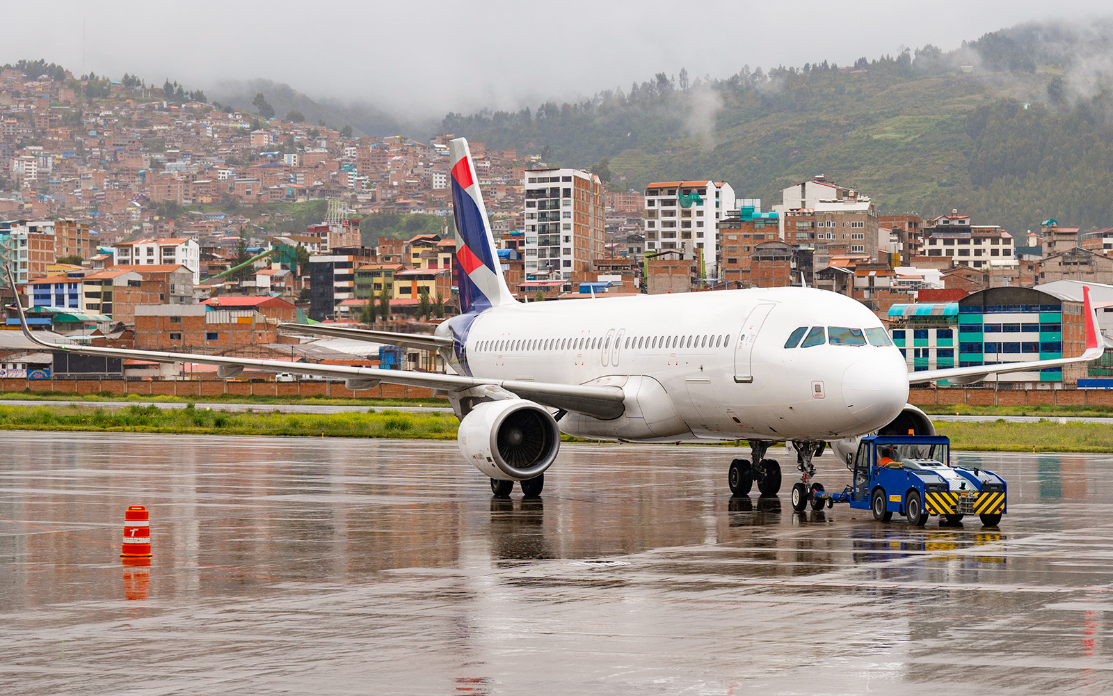 Airplane being pushed back at Alejandro Velasco Cusco, Peru