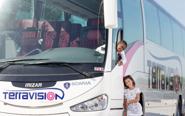 Kids at Istanbul Terravision airport transfer bus.