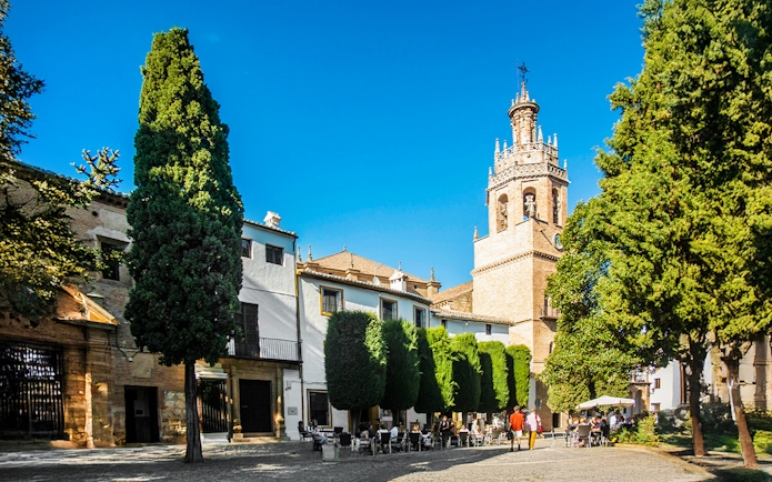 Plaza Duquesa de Parcent in Ronda with Iglesia de Santa María la Mayor tower.