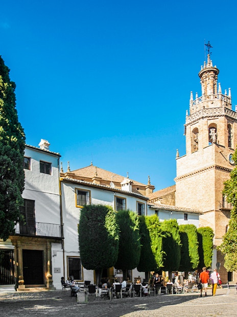 Plaza Duquesa de Parcent in Ronda with Iglesia de Santa María la Mayor tower.