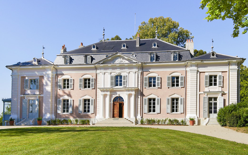 Voltaire's castle facade with entrance, Ferney-Voltaire, France.