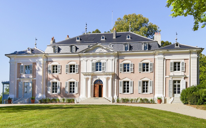 Voltaire's castle facade with entrance, Ferney-Voltaire, France.