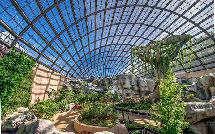 Entopia by Penang Butterfly Farm interior with lush greenery and large glass dome.