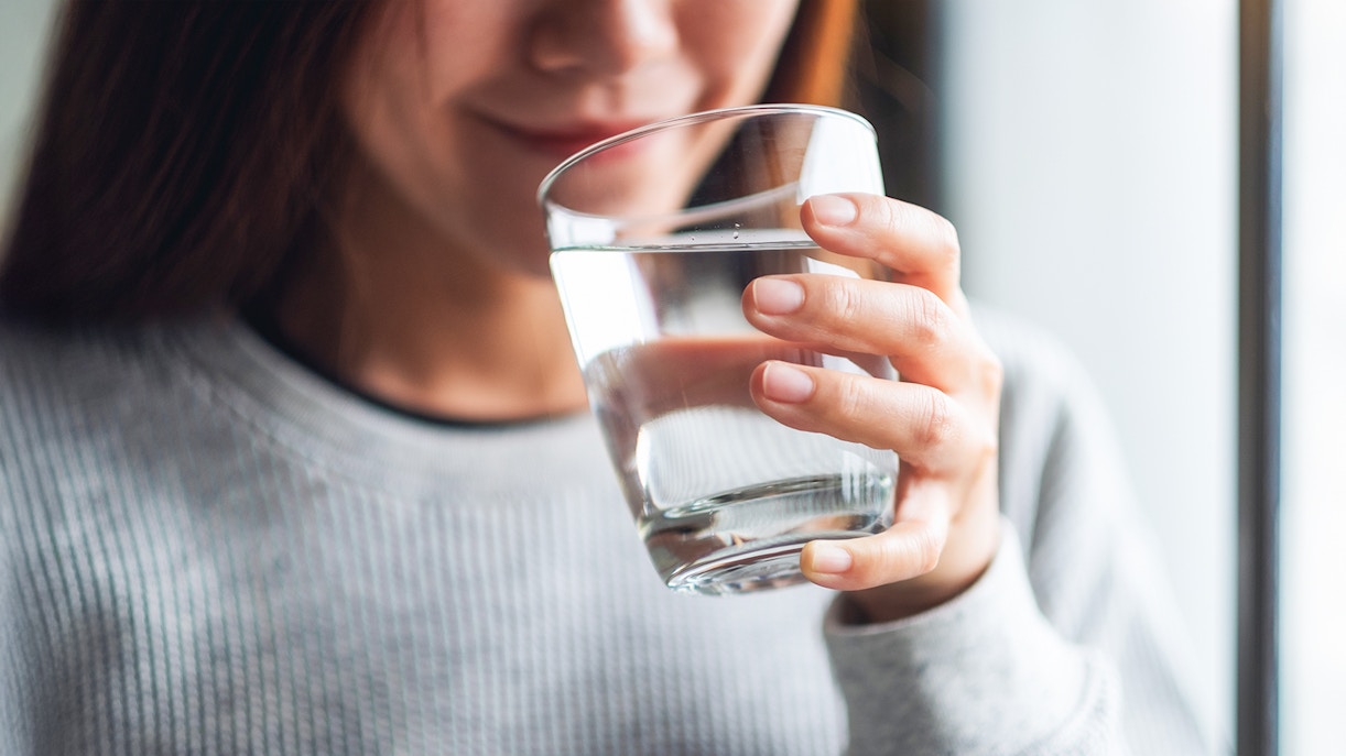 Woman drinking a glass of water