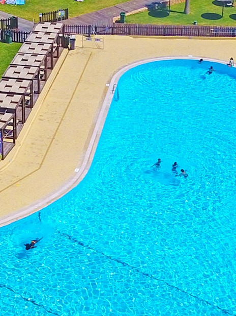 Aerial view of swimming pool and sun loungers at Zoomarine Algarve.