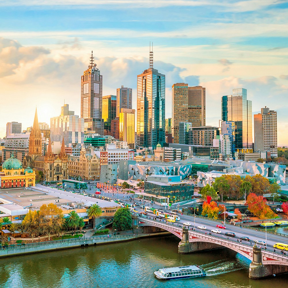 Melbourne skyline with Yarra River and Flinders Street Station in view.
