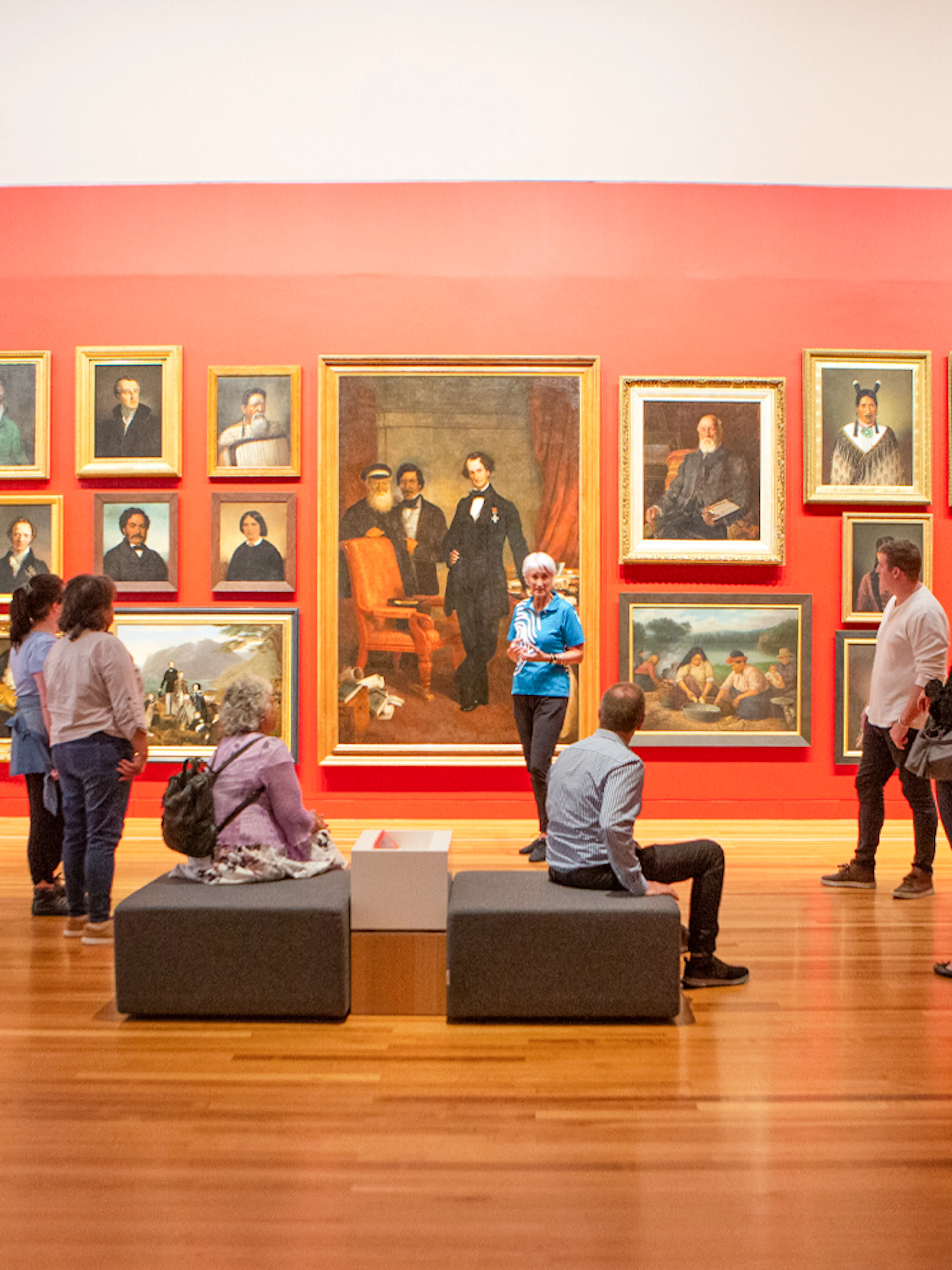 Visitors viewing portrait gallery at Museum of NZ Te Papa Tongarewa.