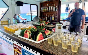 Watermelon and drinks on a boat during the Blue Lagoon Cruise from Latchi, Mediterranean Sea.