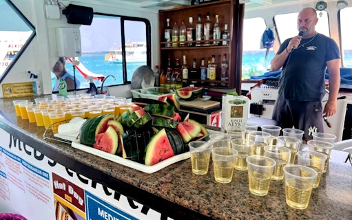Watermelon and drinks on a boat during the Blue Lagoon Cruise from Latchi, Mediterranean Sea.
