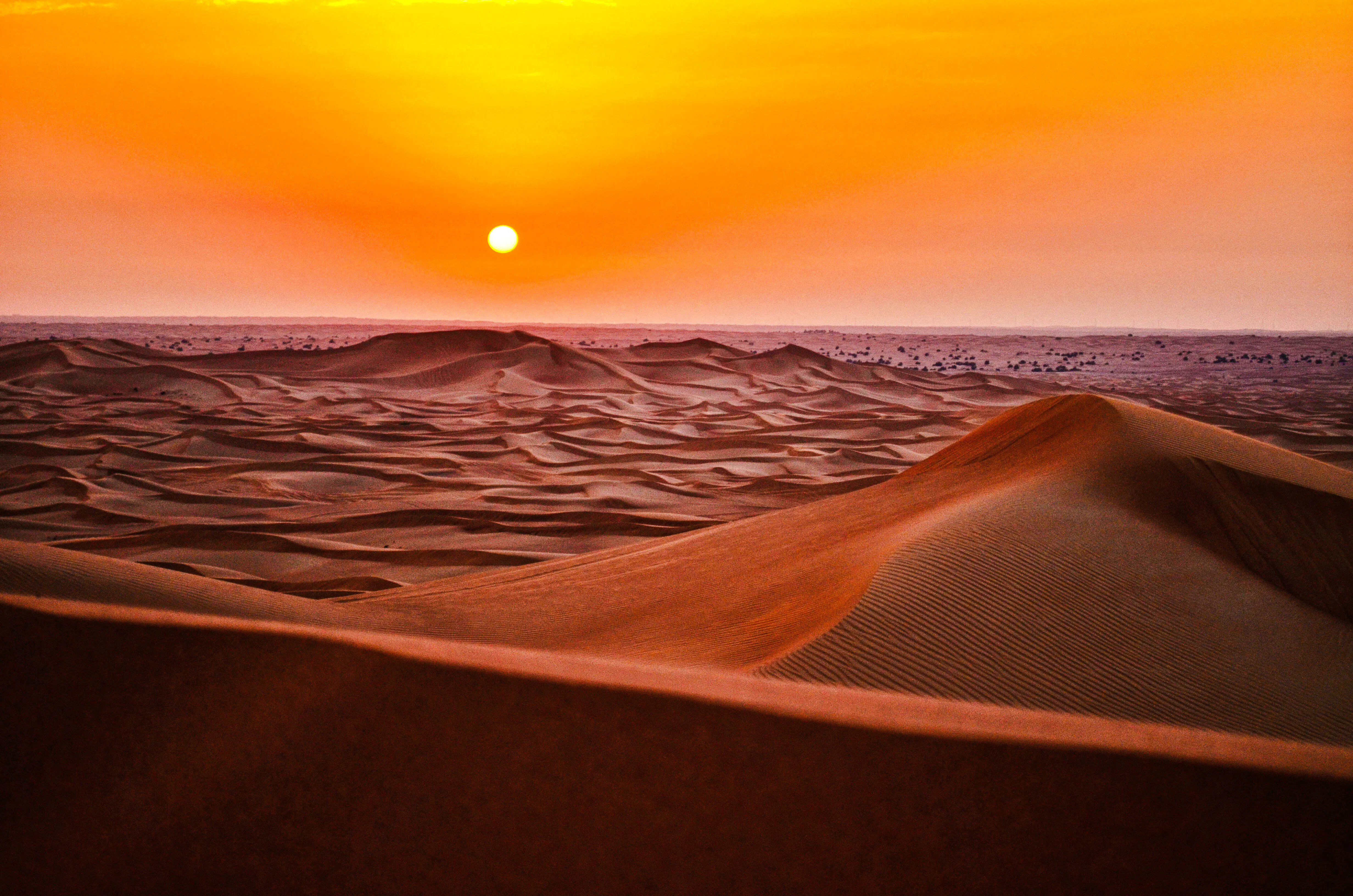 Sahara Desert dunes at sunset during 10-day Morocco tour from Casablanca.