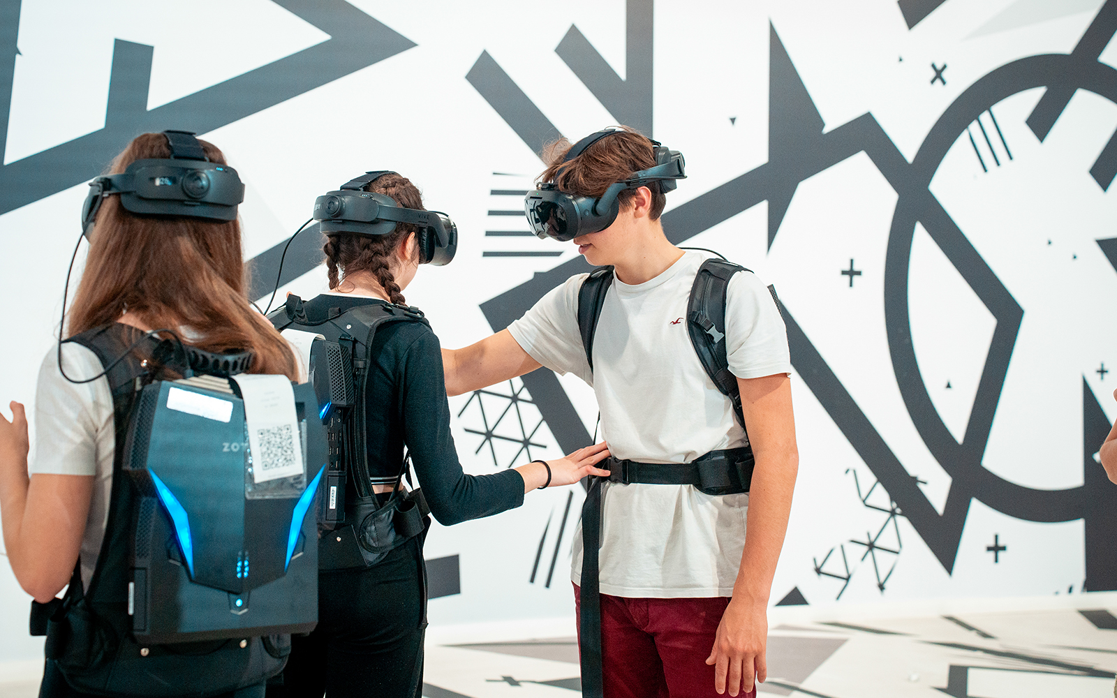 Visitors using VR headsets for the Eternal Notre-Dame experience.