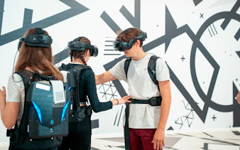 Visitors using VR headsets for the Eternal Notre-Dame experience.