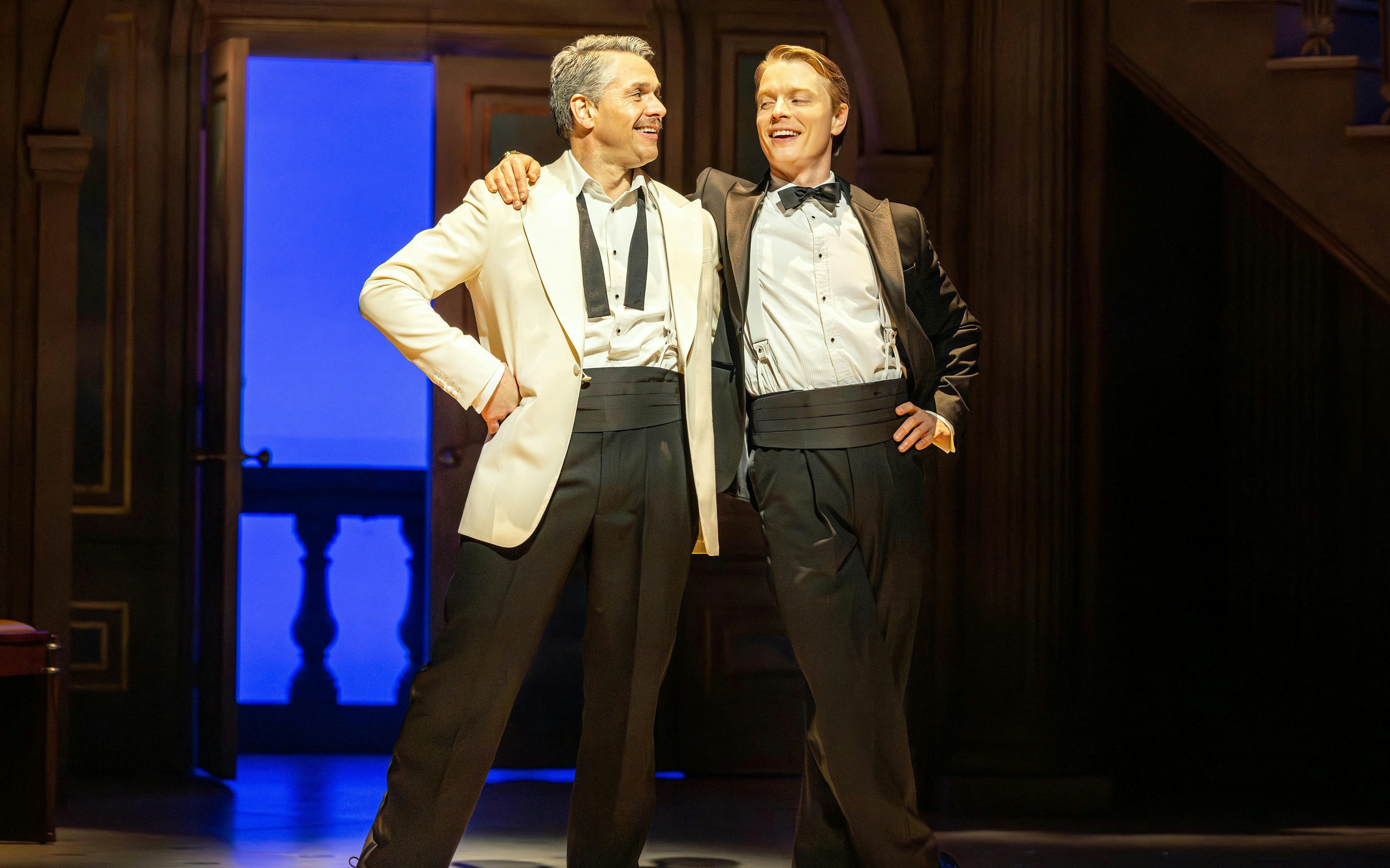 Stage actors in tuxedos performing High Society, Westend.