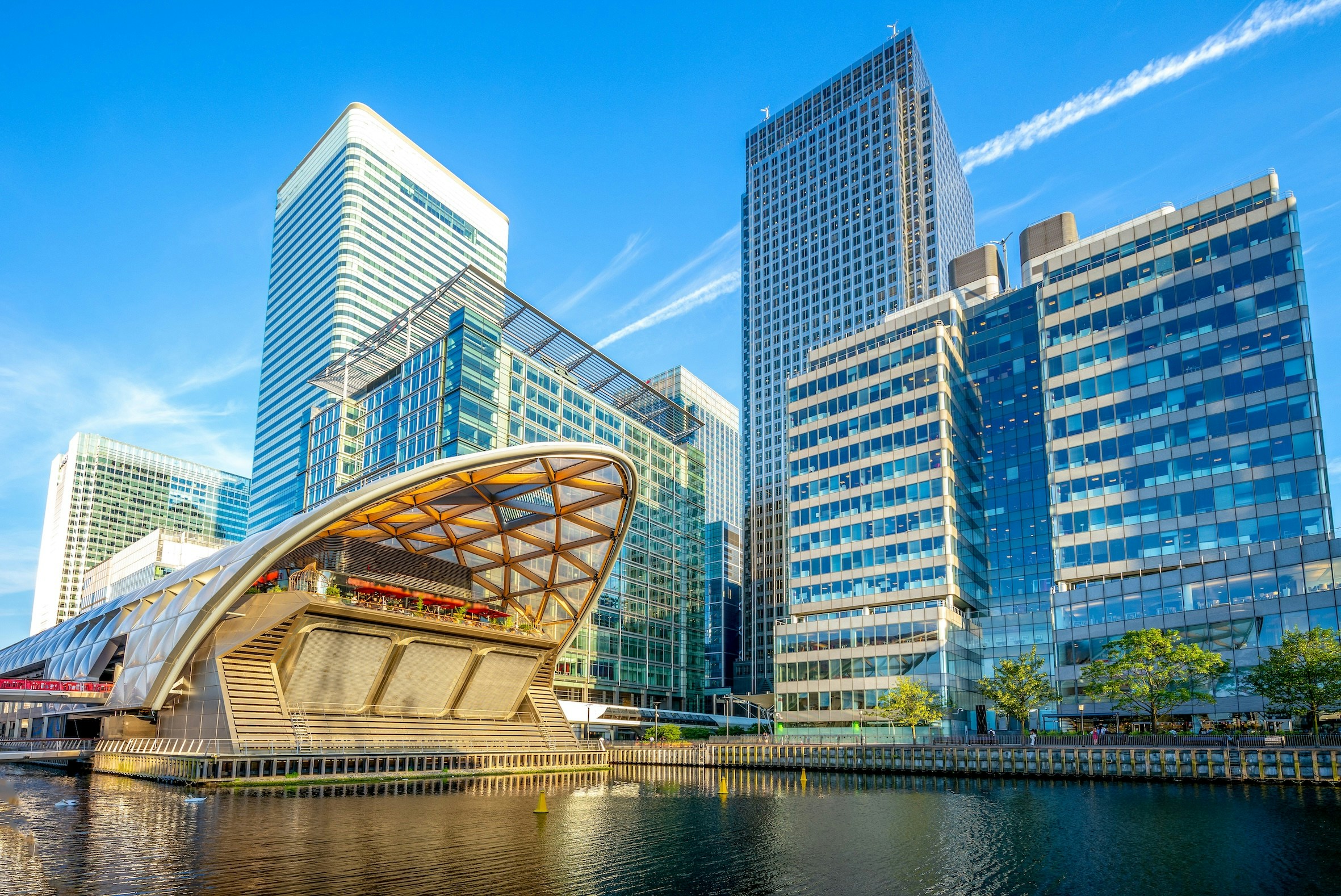 Canary Wharf skyline with modern skyscrapers and Crossrail Place in London.