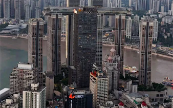 Skyscrapers along the Yangtze River in Chongqing during a city tour.