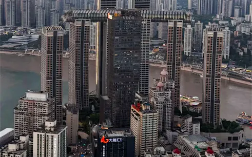 Skyscrapers along the Yangtze River in Chongqing during a city tour.