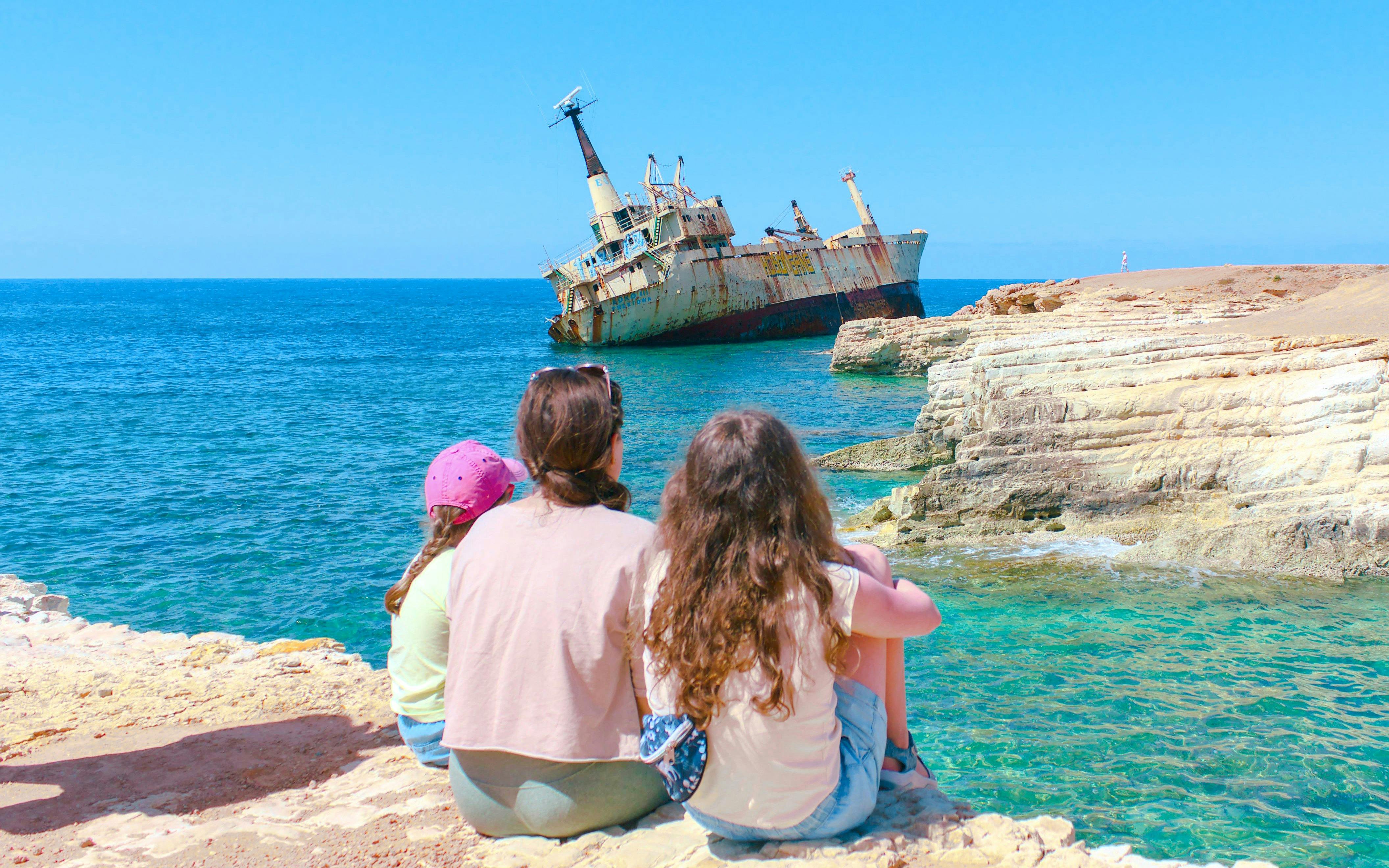 Family viewing Edro III shipwreck near Paphos coast, Cyprus.