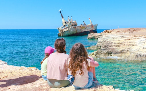 Family viewing Edro III shipwreck near Paphos coast, Cyprus.
