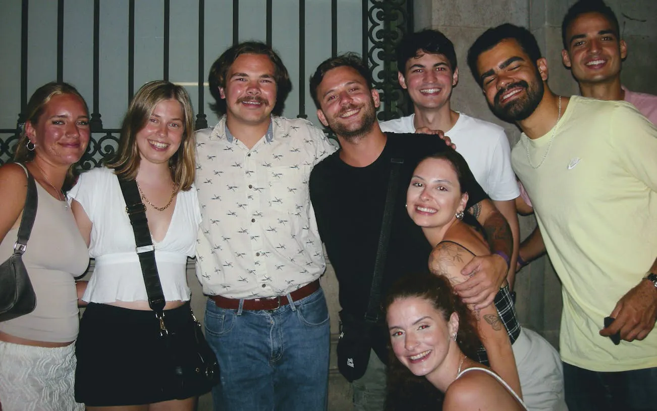 Group enjoying Barcelona bar tour with VIP club entry.