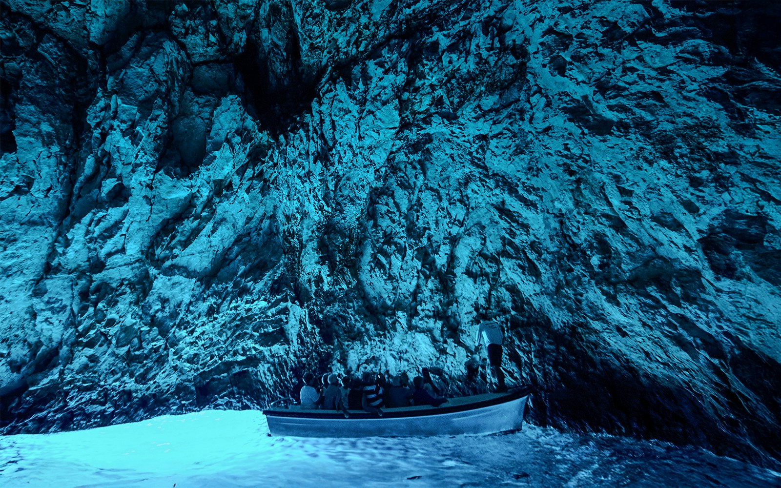Boat tour inside Blue Cave, Adriatic Sea, Croatia.