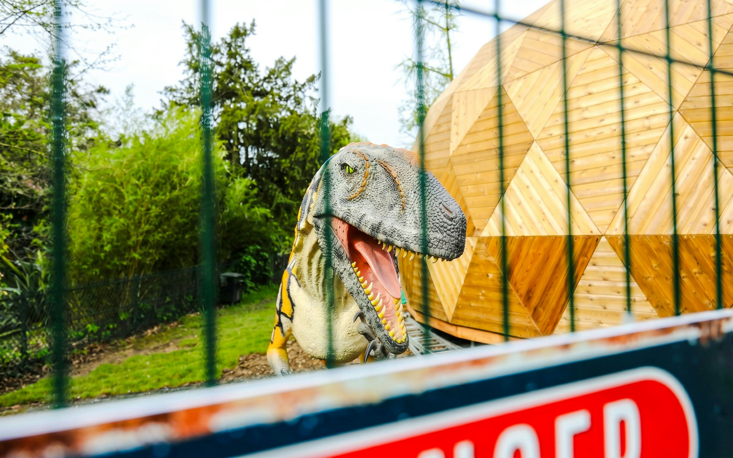 Dinosaur model at Jardin d'Acclimatation's Jurassic Island exhibit in Paris.