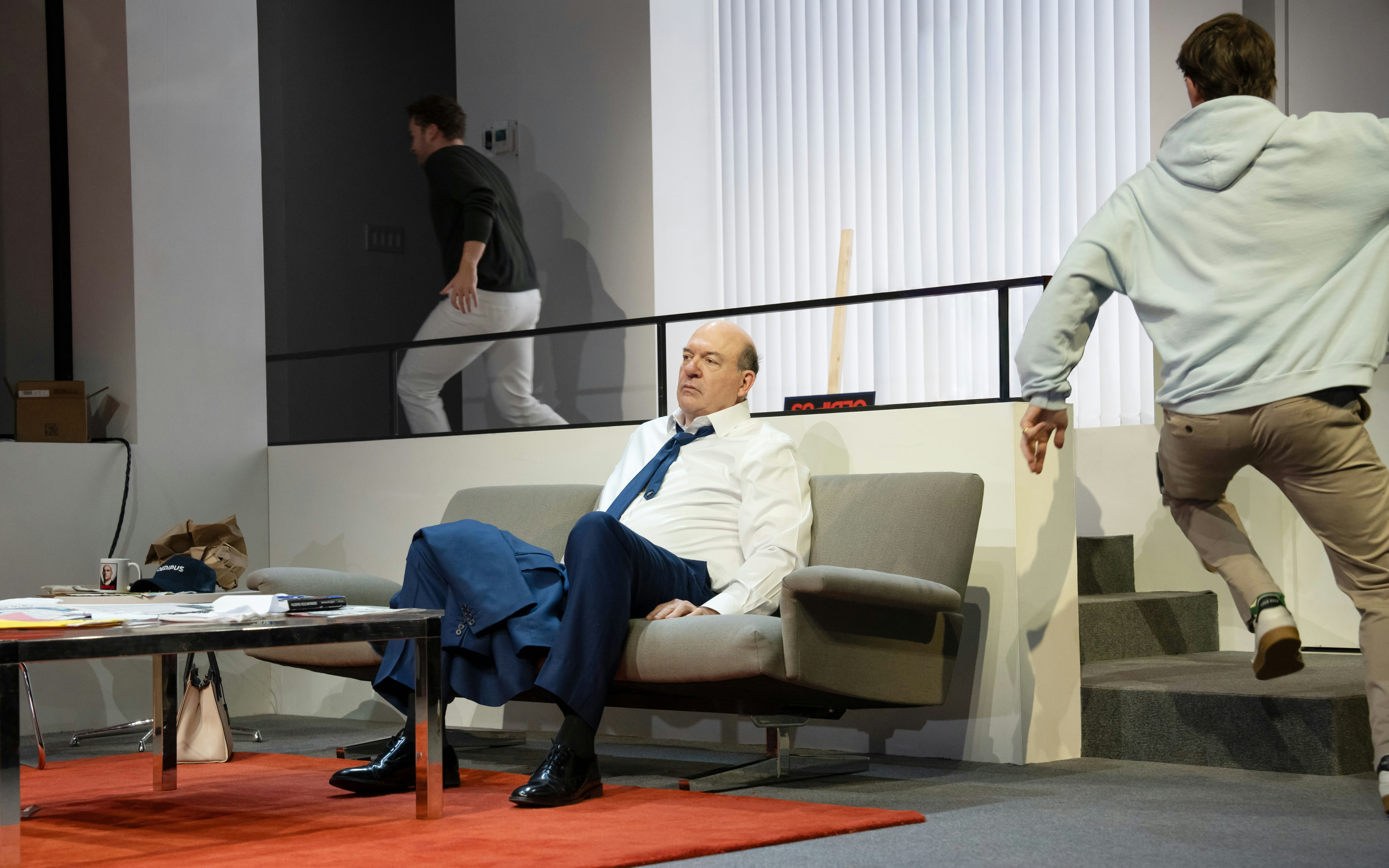 Actors performing a scene at the Oedipus Broadway show.