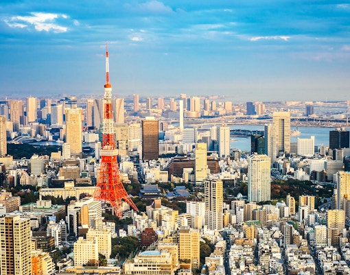 Tokyo Tower view from Tokyo Skytree, surrounded by cityscape and skyline.
