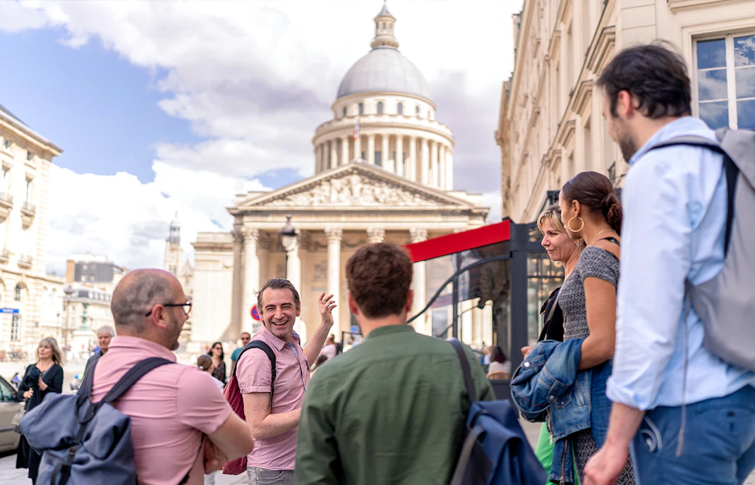 Tourists on a guided walking tour in the Latin Quarter, Paris, near the Panthéon.