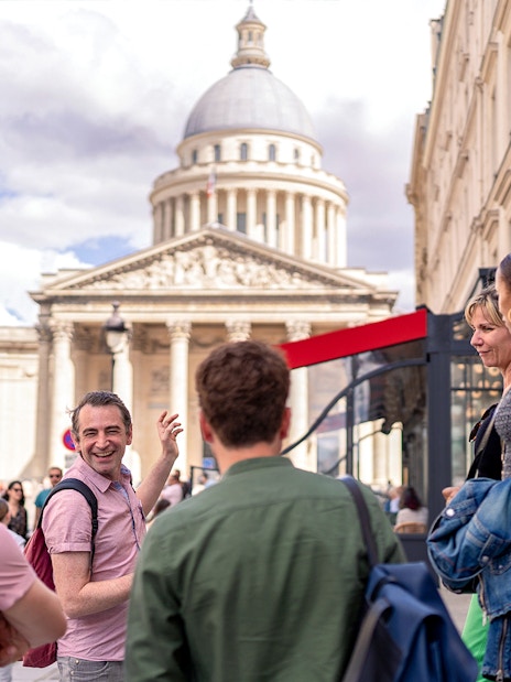 Tourists on a guided walking tour in the Latin Quarter, Paris, near the Panthéon.