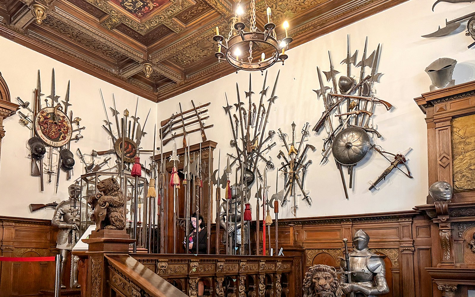 Medieval weapons display inside Peles Castle, Romania.