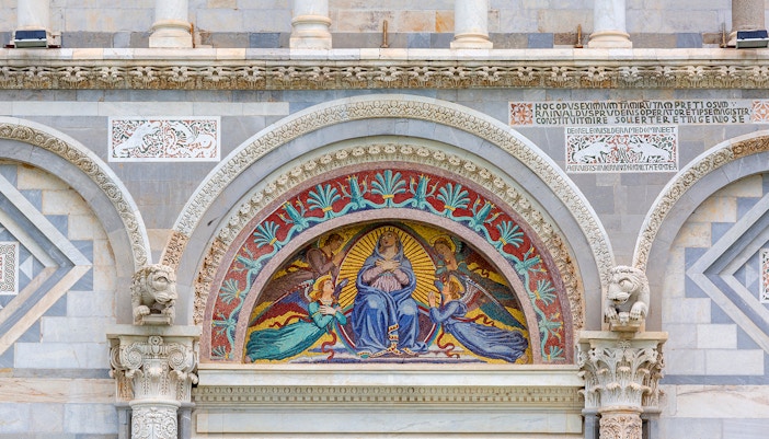 Mosaic above entrance door to Pisa Cathedral, Piazza del Duomo, Pisa, Italy.