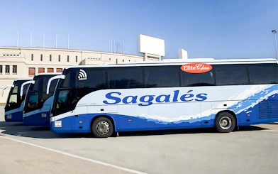 Bus at Girona Airport for transfer to Barcelona City Center.
