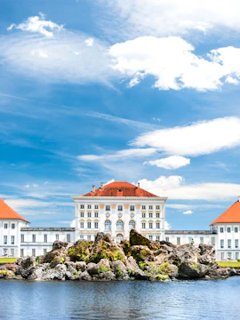 Nymphenburg Palace with gardens and water feature in Munich, Germany.