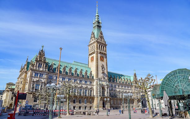 Hamburg City Hall with tourists, part of the Hop On Hop Off Bus Tour.
