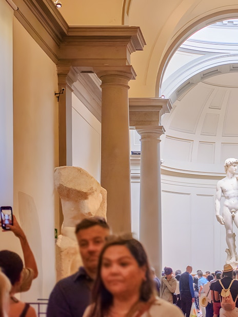 Crowd viewing Michelangelo's David in the Hall of Prisoners, Accademia Gallery, Florence.