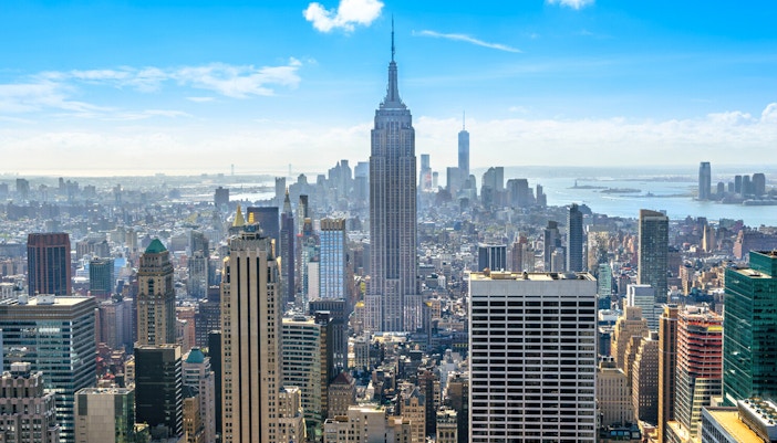 Empire State Building view from Top of the Rock, New York City skyline during guided tour.