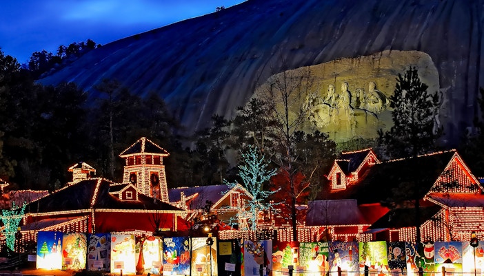Stone Mountain Christmas lights display with illuminated carvings in Atlanta.