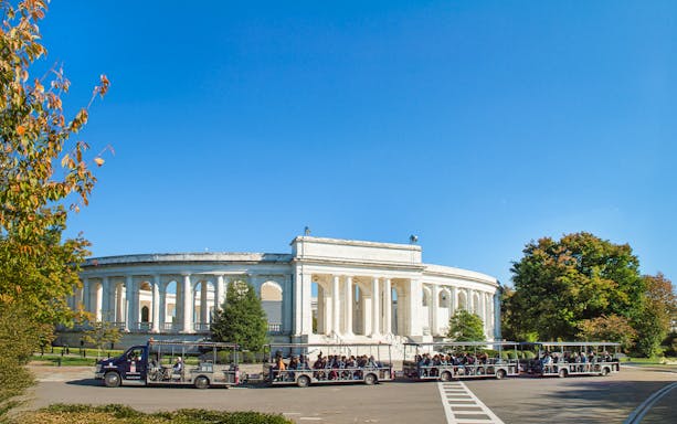 Tram tour passing Arlington National Cemetery Memorial amphitheater in Washington, D.C.