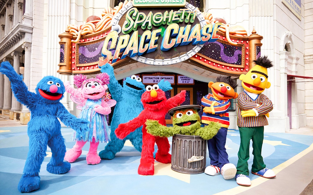 Sesame Street characters at Universal Studios Singapore's Spaghetti Space Chase entrance.