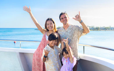 Family enjoying Star Independence Day Cruise in Hawaii.