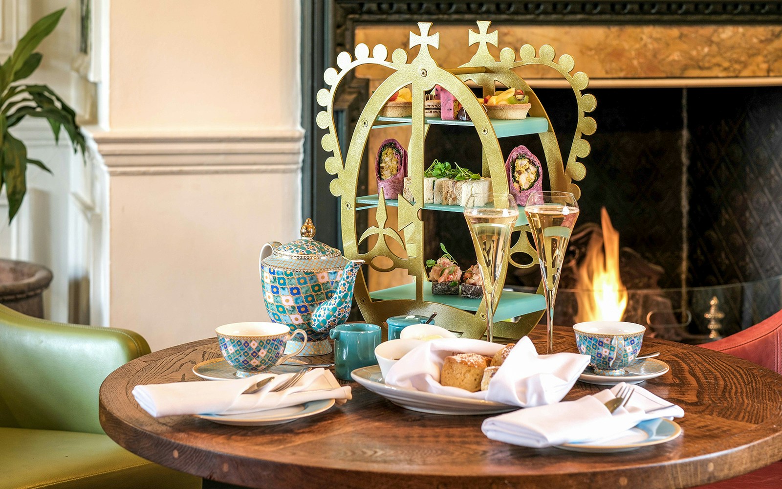 Afternoon tea setup with pastries and tea set at Windsor Castle.