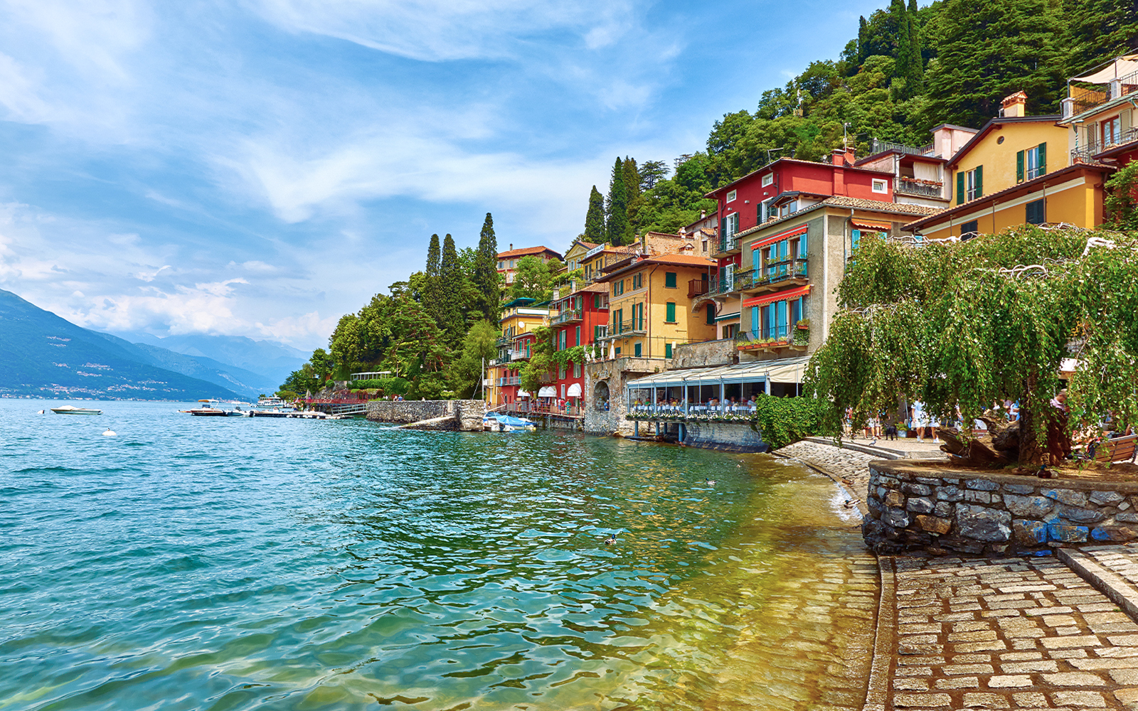 San Giovanni Beach on Lake Como with mountains in the background
