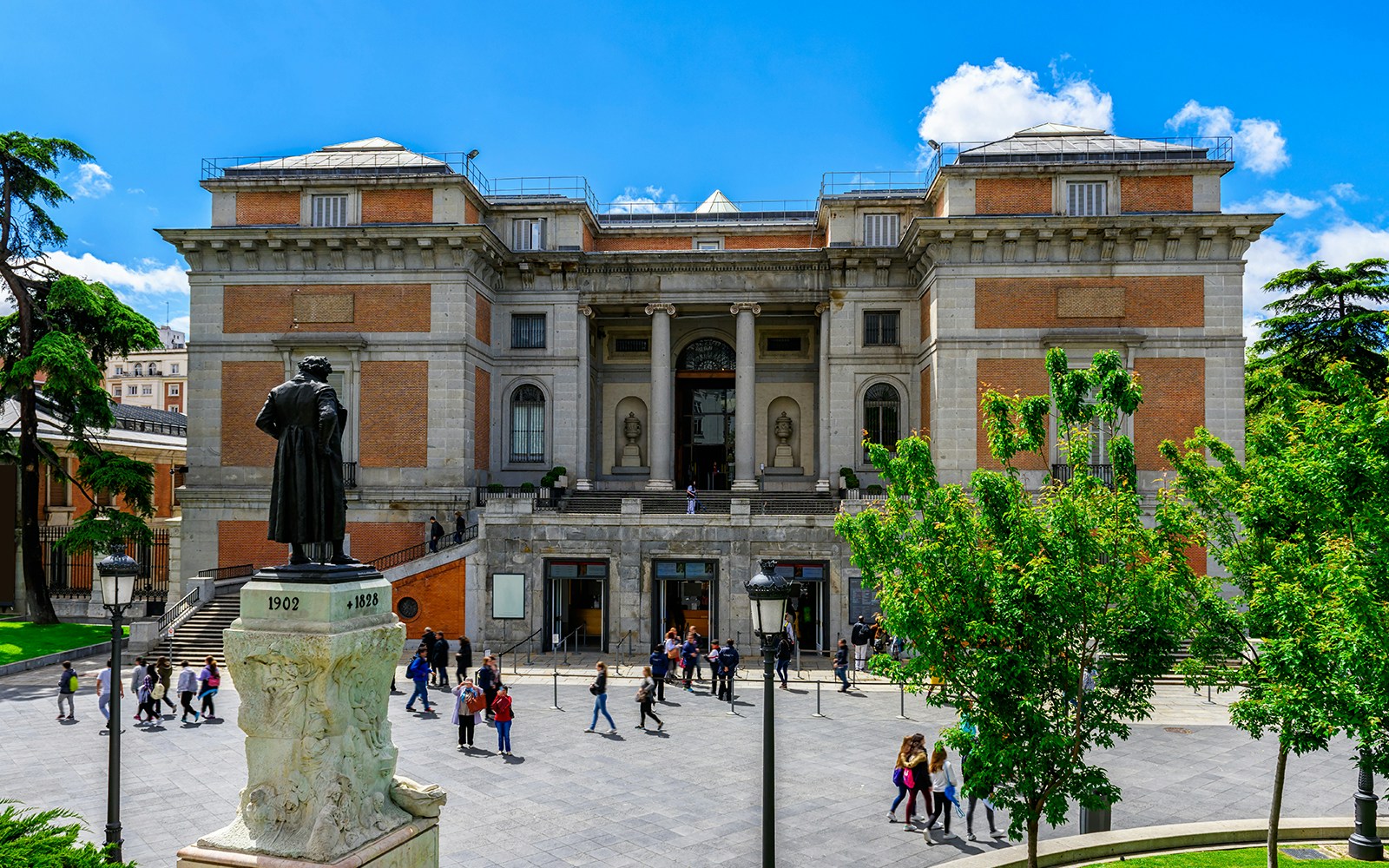 Group tour at Prado Museum, Madrid, viewing classic art exhibits.