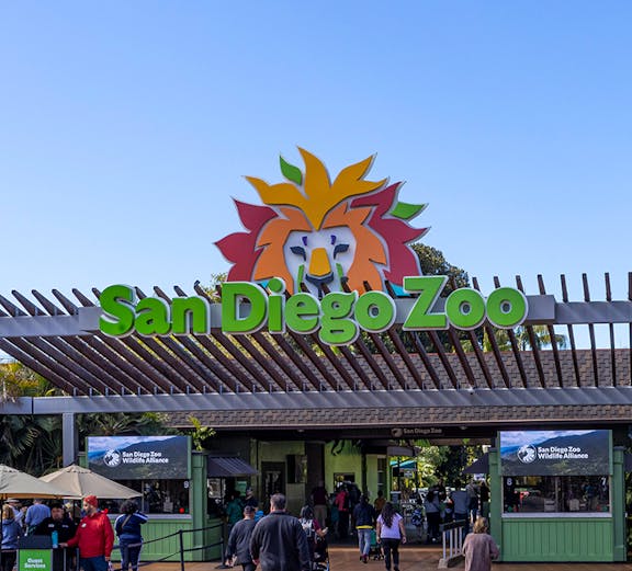 San Diego Zoo entrance with visitors walking in.