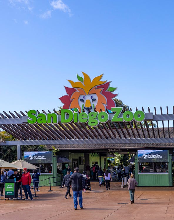 San Diego Zoo entrance with visitors walking in.