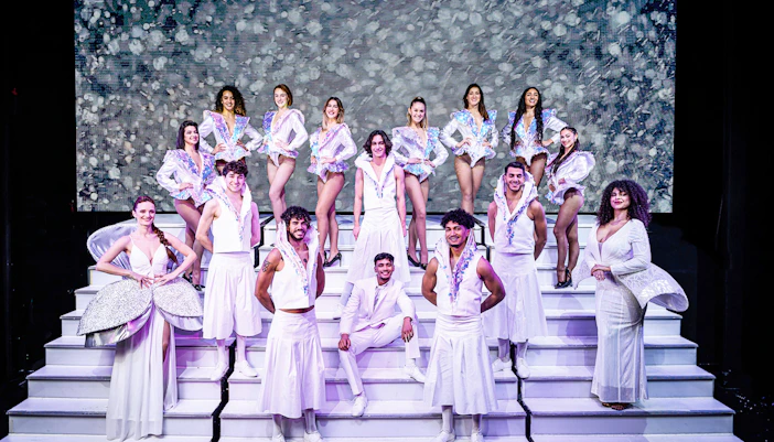 Cabaret dance performers on stage in Paris