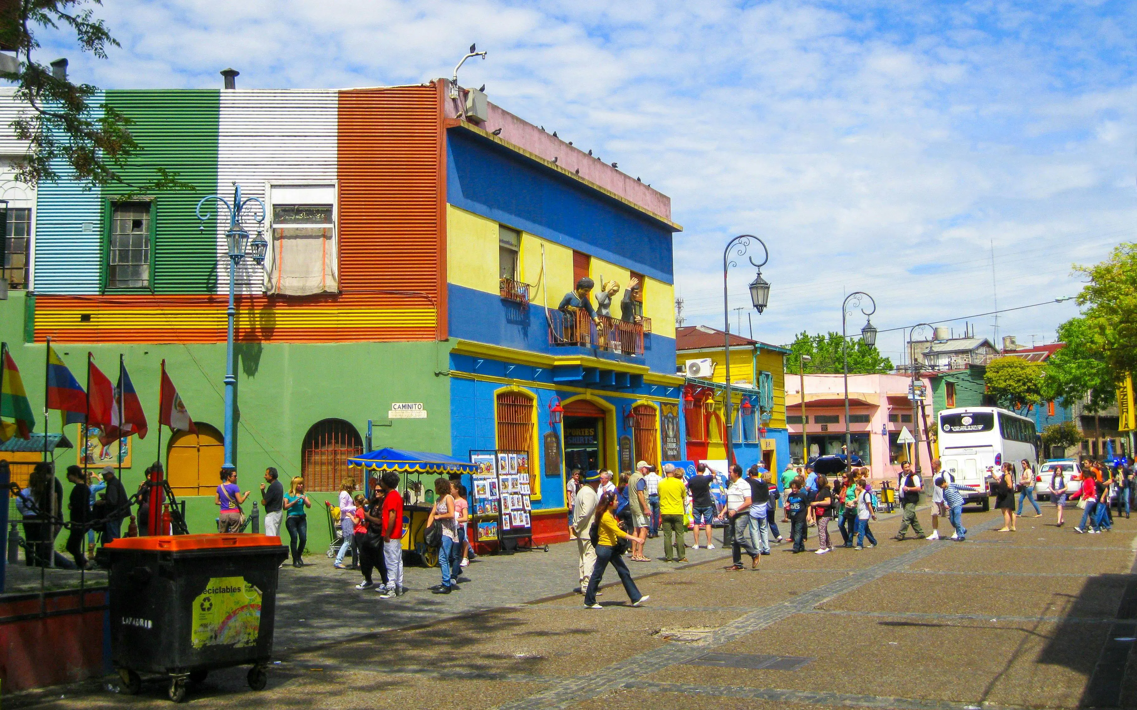Colorful buildings and tourists in the La Boca neighborhood, Buenos Aires, Argentina.