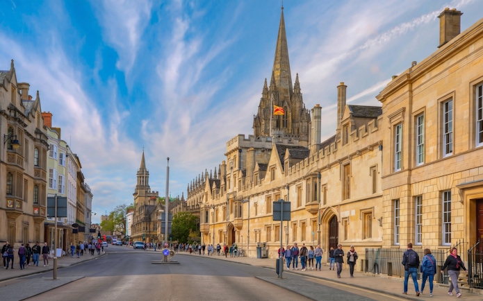 High Street in Oxford with St Mary's University Church in the background.