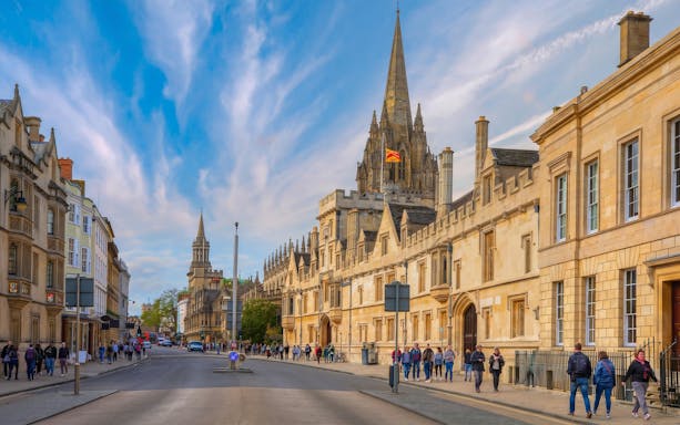 High Street in Oxford with St Mary's University Church in the background.